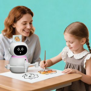 Woman and child with a robot drawing together on a table.
